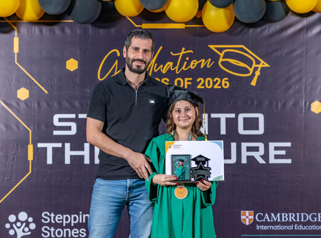 Stepping Stones Graduation 2026 - Student and Father Posing with Certificate